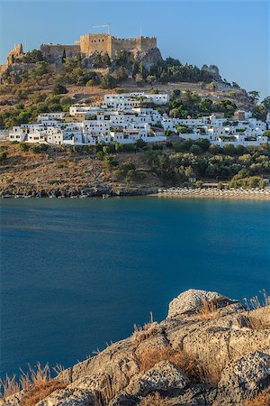 Lindos with the castle above on the Greek Island of Rhodes Stock Photo - Budget Royalty-Free & Subscription, Code: 400-07827335