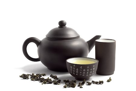green tea and teapot with cup with hieroglyphs Stockbilder - Microstock & Abonnement, Bildnummer: 400-07828198