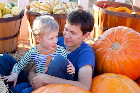 simsearch:400-07916492,k - happy family of two having fun at pumpkin patch Stock Photo - Budget Royalty-Free & Subscription, Code: 400-07828226