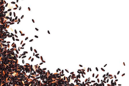 simsearch:400-07822704,k - Black rice isolated on white background with copy space. Natural rice eating background. Photographie de stock - Aubaine LD & Abonnement, Code: 400-07828322