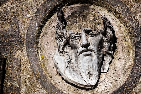simsearch:400-08254774,k - Broken face of Jesus Christ on old tombstone Stock Photo - Budget Royalty-Free & Subscription, Code: 400-07828380