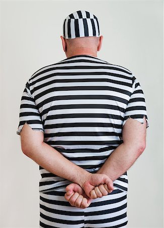 simsearch:400-04300810,k - portrait of a man prisoner in prison garb Photographie de stock - Aubaine LD & Abonnement, Code: 400-07828560