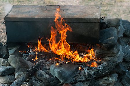 Campfire cooking in oven Stock Photo - Budget Royalty-Free & Subscription, Code: 400-07828578