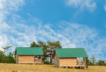Wooden cottages Stock Photo - Budget Royalty-Free & Subscription, Code: 400-07828573