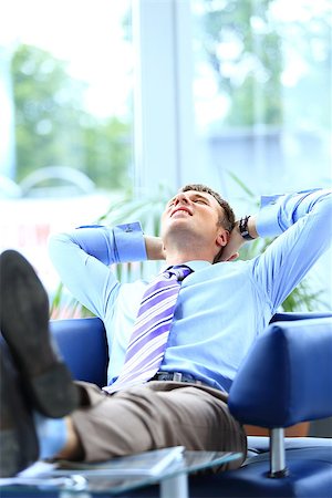 businessman relaxing in his office Stock Photo - Budget Royalty-Free & Subscription, Code: 400-07829345