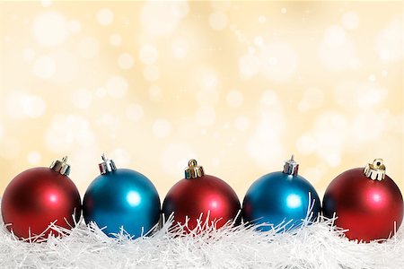 blue and red Christmas balls on the gold background with bokeh on it Stockbilder - Microstock & Abonnement, Bildnummer: 400-07829533