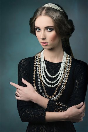 simsearch:400-07981805,k - vintage portrait of beautiful brunette woman posing like a antique dame with precious crown and necklaces, retro hair-style Stock Photo - Budget Royalty-Free & Subscription, Code: 400-07820040