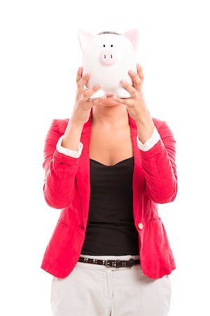 Business woman holding a piggy bank in front of the face, isolated over a white background Stock Photo - Budget Royalty-Free & Subscription, Code: 400-07820180