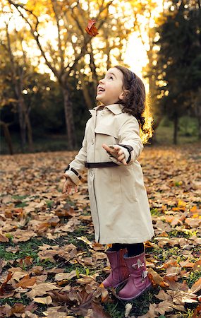 Portrait of a beautiful pretty girl in outdoor enjoying the fall season Stock Photo - Budget Royalty-Free & Subscription, Code: 400-07820212