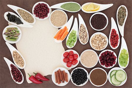 simsearch:400-08429907,k - Large weight loss diet health food selection in porcelain bowls over parchment and brown paper background. Fotografie stock - Microstock e Abbonamento, Codice: 400-07820972