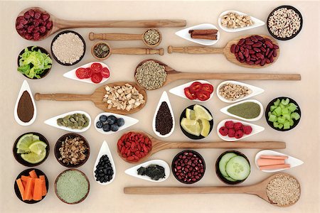 Large diet and weight loss superfood selection in bowls and wooden spoons over mottled cream background. Photographie de stock - Aubaine LD & Abonnement, Code: 400-07821062