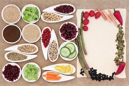 simsearch:400-08429907,k - Large weight loss diet health food selection in porcelain bowls over parchment and brown paper background. Fotografie stock - Microstock e Abbonamento, Codice: 400-07821078