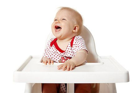 Little baby sitting at the table and shouting. Isolated on white background. Stock Photo - Budget Royalty-Free & Subscription, Code: 400-07821108