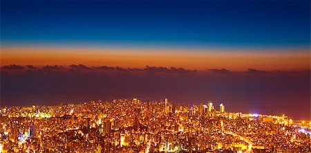 Bird eye view of beautiful night cityscape, many glowing lights in nighttime in Lebanon, picturesque scene, travel and tourism concept Foto de stock - Super Valor sin royalties y Suscripción, Código: 400-07821482
