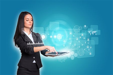 simsearch:400-07895693,k - Beautiful businesswomen in suit using digital tablet. Glow circles, transparent rectangles, graphs and network Stock Photo - Budget Royalty-Free & Subscription, Code: 400-07821746