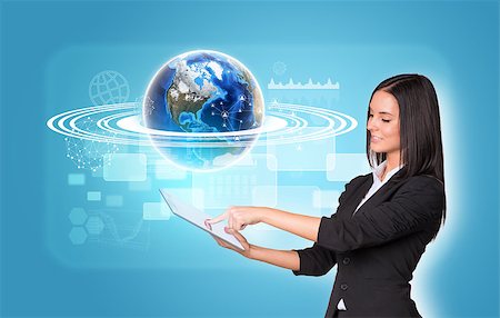simsearch:400-07895693,k - Beautiful businesswomen in suit using digital tablet. Earth with transparent rectangles, graphs and network. Element of this image furnished by NASA Stock Photo - Budget Royalty-Free & Subscription, Code: 400-07821812