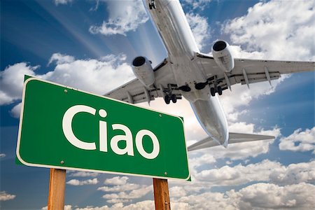 Ciao Green Road Sign and Airplane Above with Dramatic Blue Sky and Clouds. Foto de stock - Super Valor sin royalties y Suscripción, Código: 400-07821894