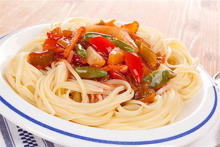 simsearch:656-02702879,k - Culinary pasta with fresh vegetables on white plate. Delicious asian cuisine. Photographie de stock - Aubaine LD & Abonnement, Code: 400-07822686