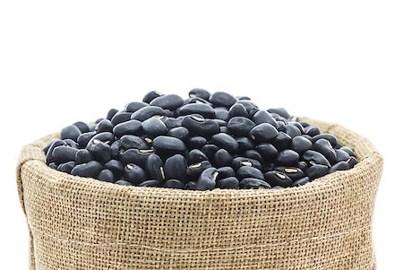 Close up dried black beans in Sacks fodder on white background Foto de stock - Super Valor sin royalties y Suscripción, Código: 400-07822922