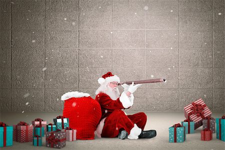 Santa looking through a telescope against grey room Stock Photo - Budget Royalty-Free & Subscription, Code: 400-07834608