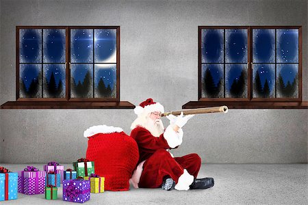 Santa looking through telescope against grey room Stock Photo - Budget Royalty-Free & Subscription, Code: 400-07834619