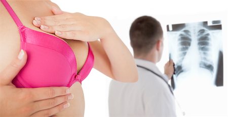 Composite image of closeup of woman performing self breast examination Photographie de stock - Aubaine LD & Abonnement, Code: 400-07834959