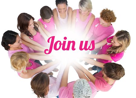 simsearch:400-06932882,k - Cheerful women joined in a circle wearing pink for breast cancer on white background Stock Photo - Budget Royalty-Free & Subscription, Code: 400-07835061