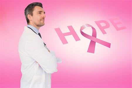 Doctor with breast cancer awareness message for awareness month Stock Photo - Budget Royalty-Free & Subscription, Code: 400-07835089
