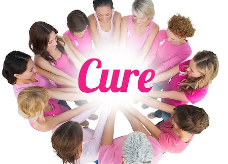 simsearch:400-06932887,k - Cheerful women joined in a circle wearing pink for breast cancer on white background Fotografie stock - Microstock e Abbonamento, Codice: 400-07835095