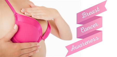 simsearch:400-06870717,k - Closeup of woman performing self breast examination against breast cancer awareness message Stock Photo - Budget Royalty-Free & Subscription, Code: 400-07835134