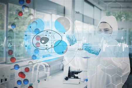 Scientist in protective suit working with cell diagram interface against dna helix in blue and red with ecg line Stock Photo - Budget Royalty-Free & Subscription, Code: 400-07835287