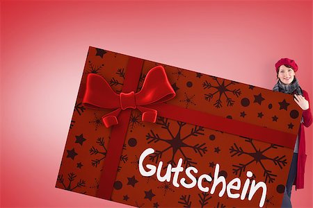 simsearch:400-07834588,k - Couple holding a large sign against gift card with festive bow Fotografie stock - Microstock e Abbonamento, Codice: 400-07835371