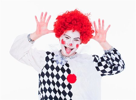 Little Girl in Red Wig, Makeup and Outfit Posing as a Clown. Stock Photo - Budget Royalty-Free & Subscription, Code: 400-07835617