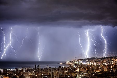 Night cityscape with strong lightning, majestic view on coastal town in dark stormy night, dramatic skyscape with bright zipper Stock Photo - Budget Royalty-Free & Subscription, Code: 400-07835891