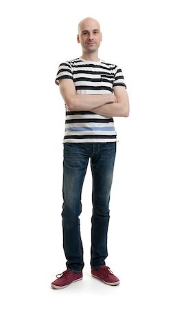 Full length portrait of a stylish young man standing over white background Stock Photo - Budget Royalty-Free & Subscription, Code: 400-07835957