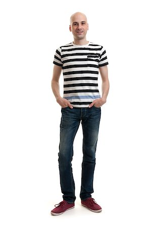 Full length portrait of a stylish young man standing over white background Stock Photo - Budget Royalty-Free & Subscription, Code: 400-07835959