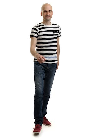 Full length portrait of a stylish young man standing over white background Stock Photo - Budget Royalty-Free & Subscription, Code: 400-07835960