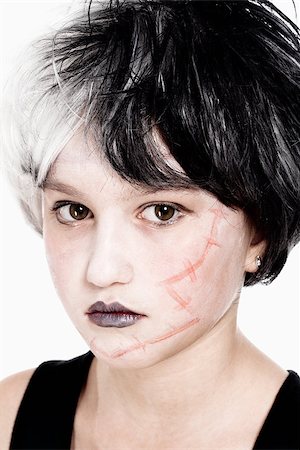 scars - Portrait of a Young Girl in Wig Posing as Frankenstein Stock Photo - Budget Royalty-Free & Subscription, Code: 400-07836040