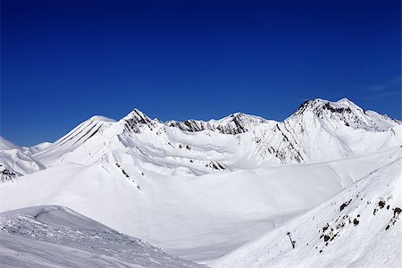 simsearch:400-08780271,k - View from ski slope in nice sun day. Caucasus Mountains, Georgia. Ski resort Gudauri. Photographie de stock - Aubaine LD & Abonnement, Code: 400-07836197
