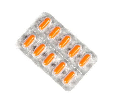 simsearch:400-05135660,k - top of view of orange pills packed in blister isolated on white background Stockbilder - Microstock & Abonnement, Bildnummer: 400-07836404