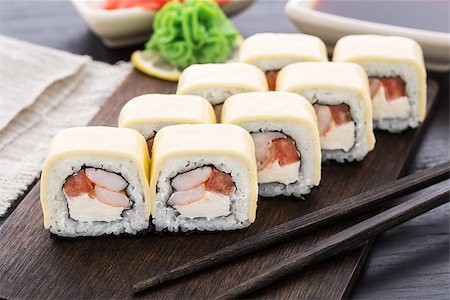 Sushi rolls with shrimps, tomato and cheddar cheese Stock Photo - Budget Royalty-Free & Subscription, Code: 400-07836799