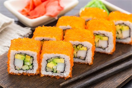 Sushi roll with tobico, avocado and shrimp Stock Photo - Budget Royalty-Free & Subscription, Code: 400-07836791