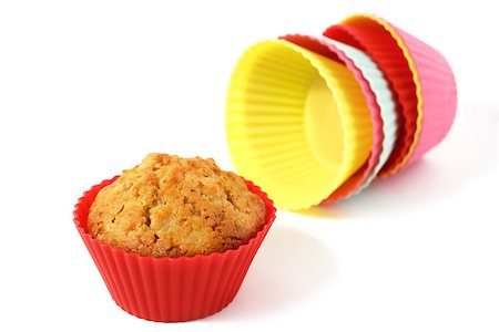 muffin in silicone baking cup with a stack of silicone baking cups Photographie de stock - Aubaine LD & Abonnement, Code: 400-07836818