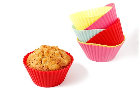 muffin in silicone baking cup with a stack of silicone baking cups Photographie de stock - Aubaine LD & Abonnement, Code: 400-07836819