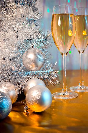 Christmas tree, toy balloons and glasses of wine with evening lighting Stock Photo - Budget Royalty-Free & Subscription, Code: 400-07836939