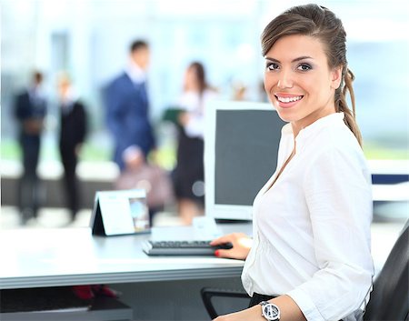 Modern business woman in the office Stock Photo - Budget Royalty-Free & Subscription, Code: 400-07837454