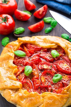 Galette with tomato and basil on a table Stock Photo - Budget Royalty-Free & Subscription, Code: 400-07837863