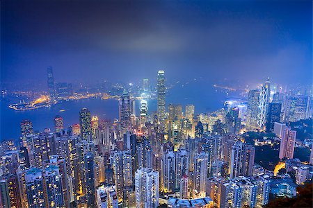 simsearch:841-02717306,k - Image of Hong Kong with many skyscrapers during twilight blue hour. Photographie de stock - Aubaine LD & Abonnement, Code: 400-07837884