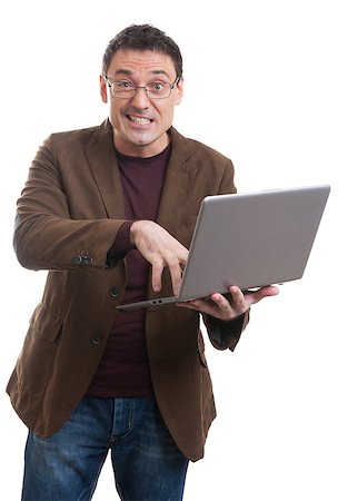 simsearch:400-09030070,k - Portrait of an angry man with his laptop, isolated on white background Stock Photo - Budget Royalty-Free & Subscription, Code: 400-07838185