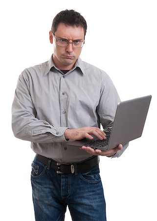 simsearch:400-09030070,k - Portrait of an angry business man with laptop, on white background Fotografie stock - Microstock e Abbonamento, Codice: 400-07838213